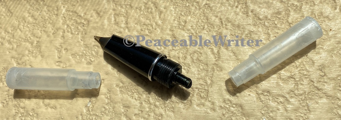 nib section with empty vintage ink cartridges Alt text